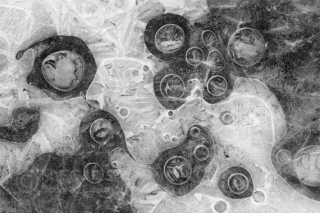 Ice shapes on a frozen lake - Italy