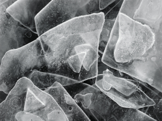 Ice shapes on a frozen lake - Italy